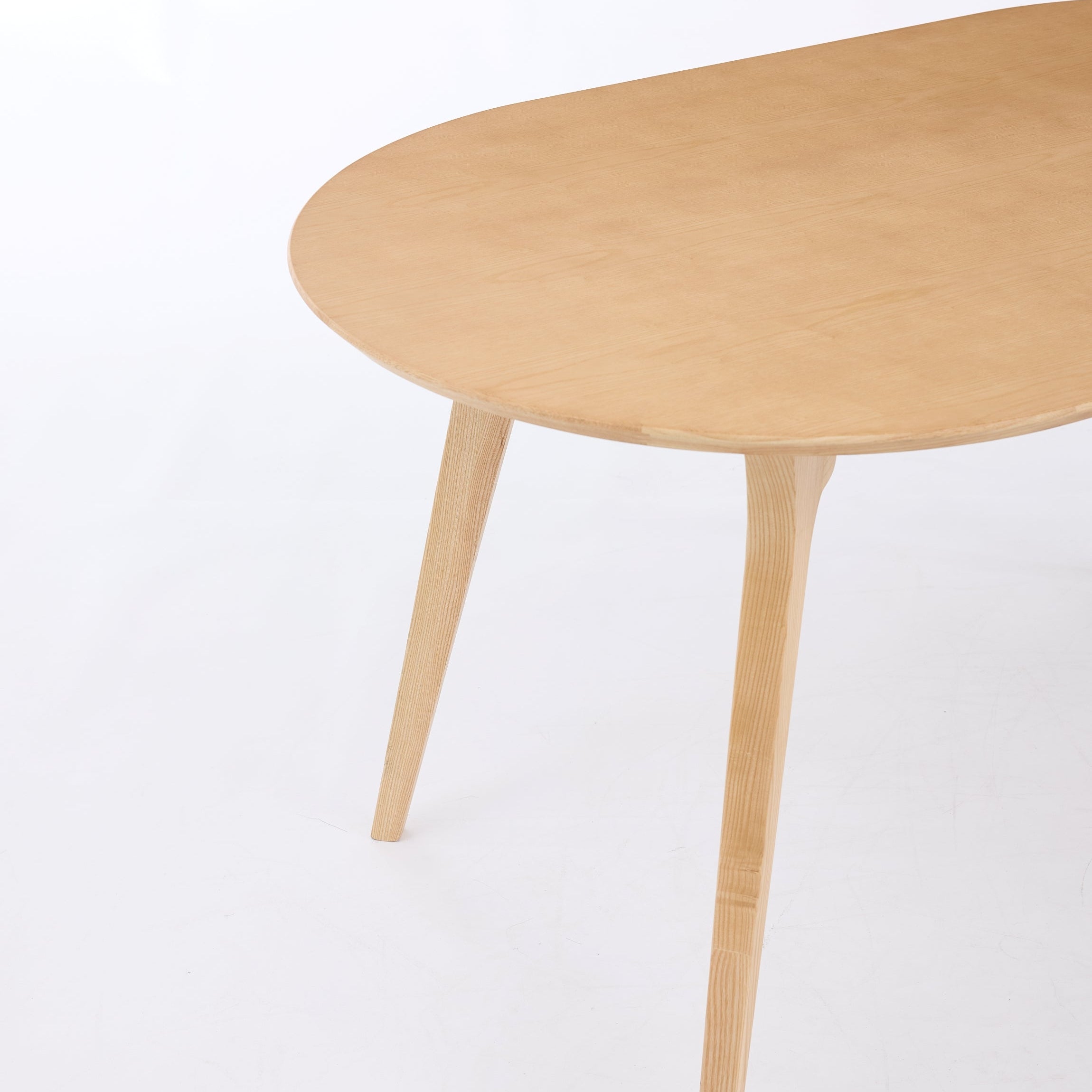 Wooden round table on a white background