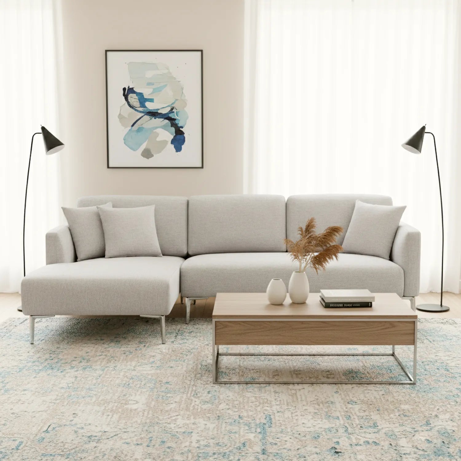 Modern living room with a gray sectional sofa, wooden coffee table, and abstract art on the wall.