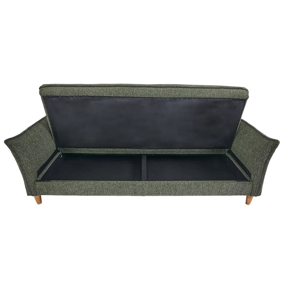 Green sofa with black cushions on a white background