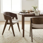 Dining table set with chairs in a bright room