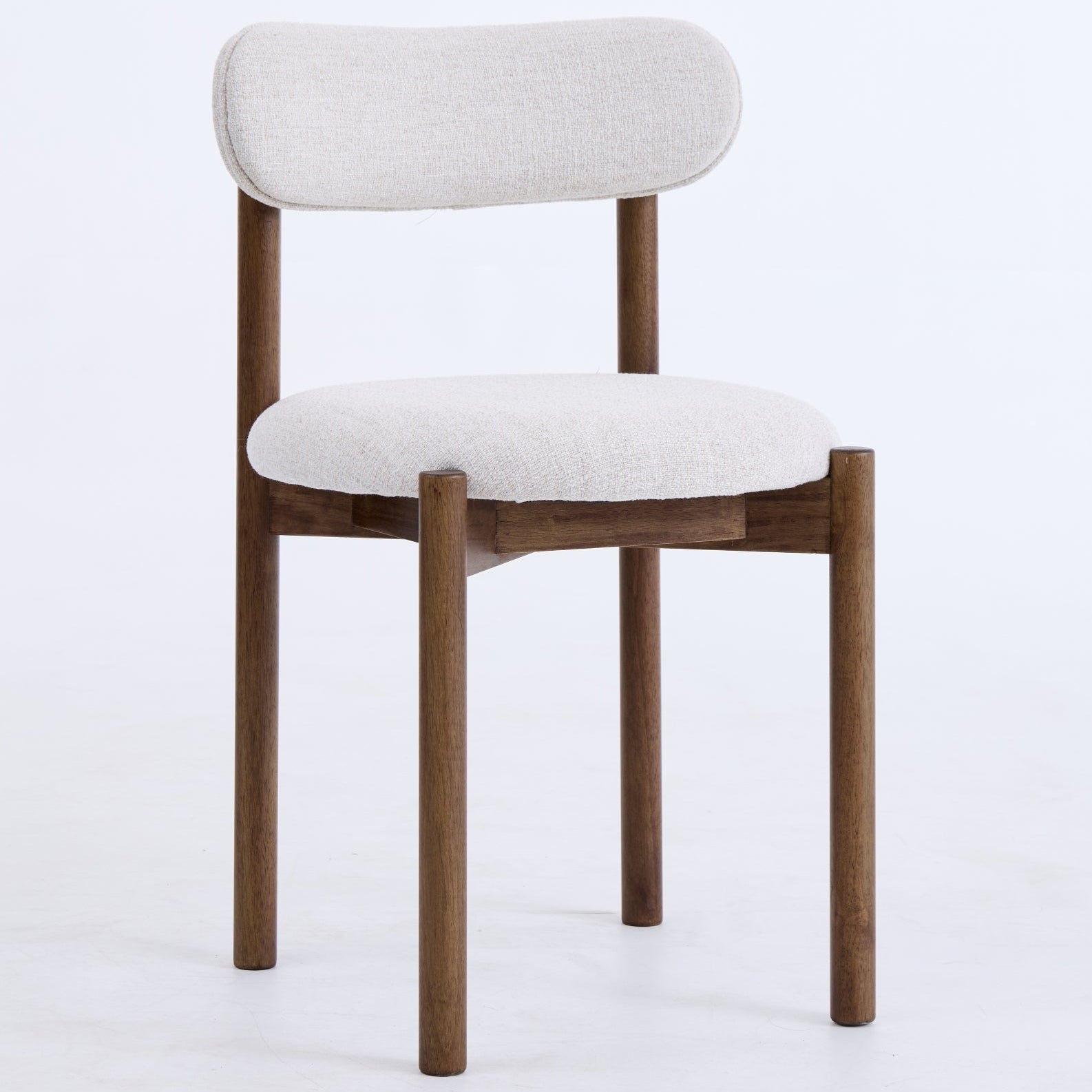 Chair with wooden frame and white cushion on a light gray background