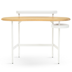 Wooden table with white legs on a white background