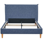 Blue upholstered bed with wooden legs on a white background