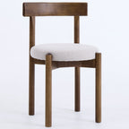 Wooden chair with a white cushion on a white background