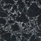 Round black marble coaster with a white background