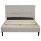 Beige upholstered bed with wooden slats on a white background