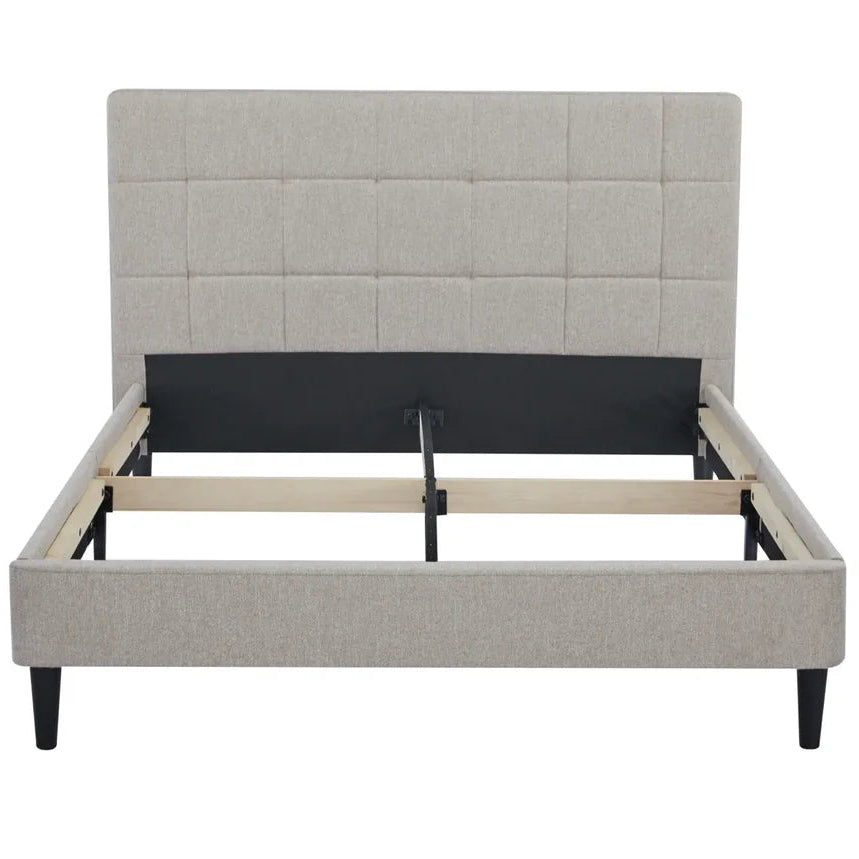 Gray upholstered bed frame on a white background