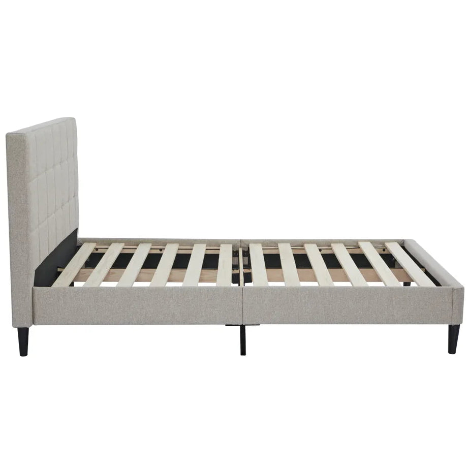 Beige upholstered bed frame with slats on a white background