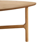 Wooden coffee table with a minimalist design on a white background