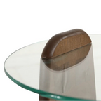 Glass table with a wooden leg on a white background