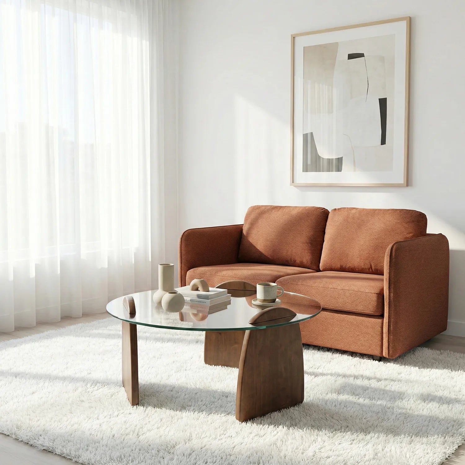 Modern living room with brown sofa, glass coffee table, and abstract art on white wall.